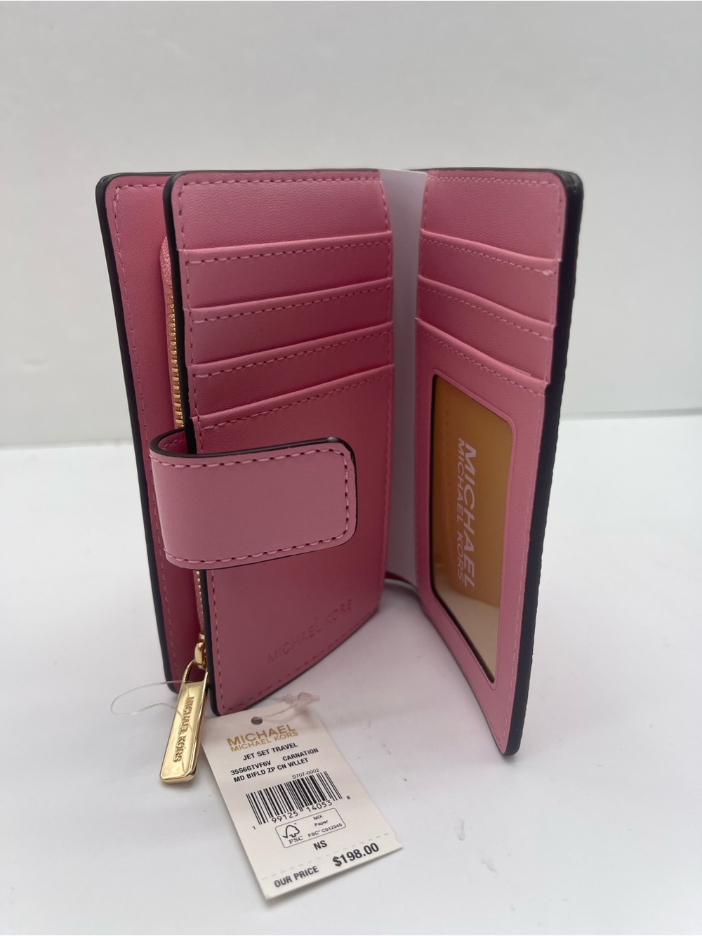 MICHAEL KORS Jet Set Travel Medium MK Logo Debossed Bifold Wallet
Carnation
NWT - Picture 9 of 16